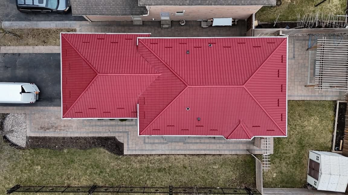Burgundy metal roof viewed from above